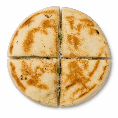Tikona Chicken Pita Bread cut into four quarters with creamy chicken and capsicum filling